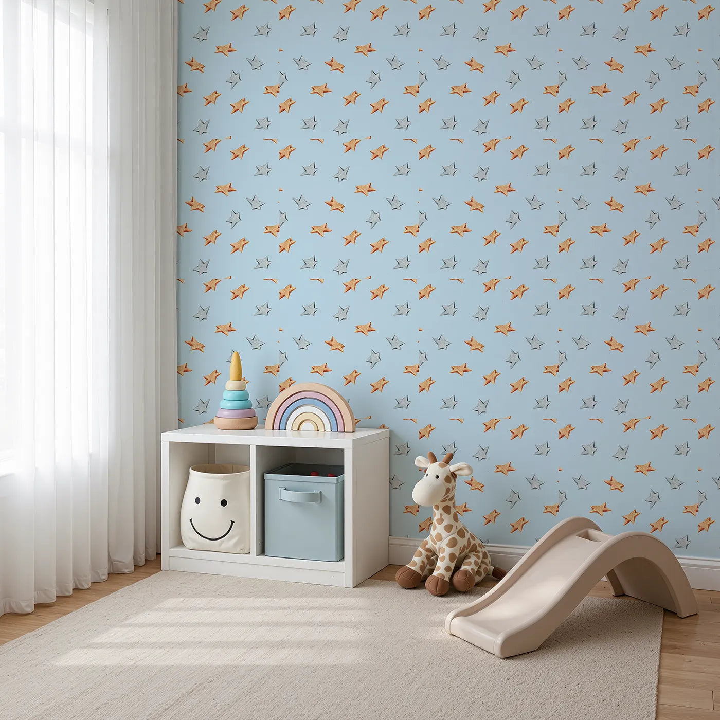 Angled view of Whimsy Tots' Wooden Star Sprinkle Wallpaper in Blue (W3315E).Orange and silver stars float peacefully across soft blue skies.