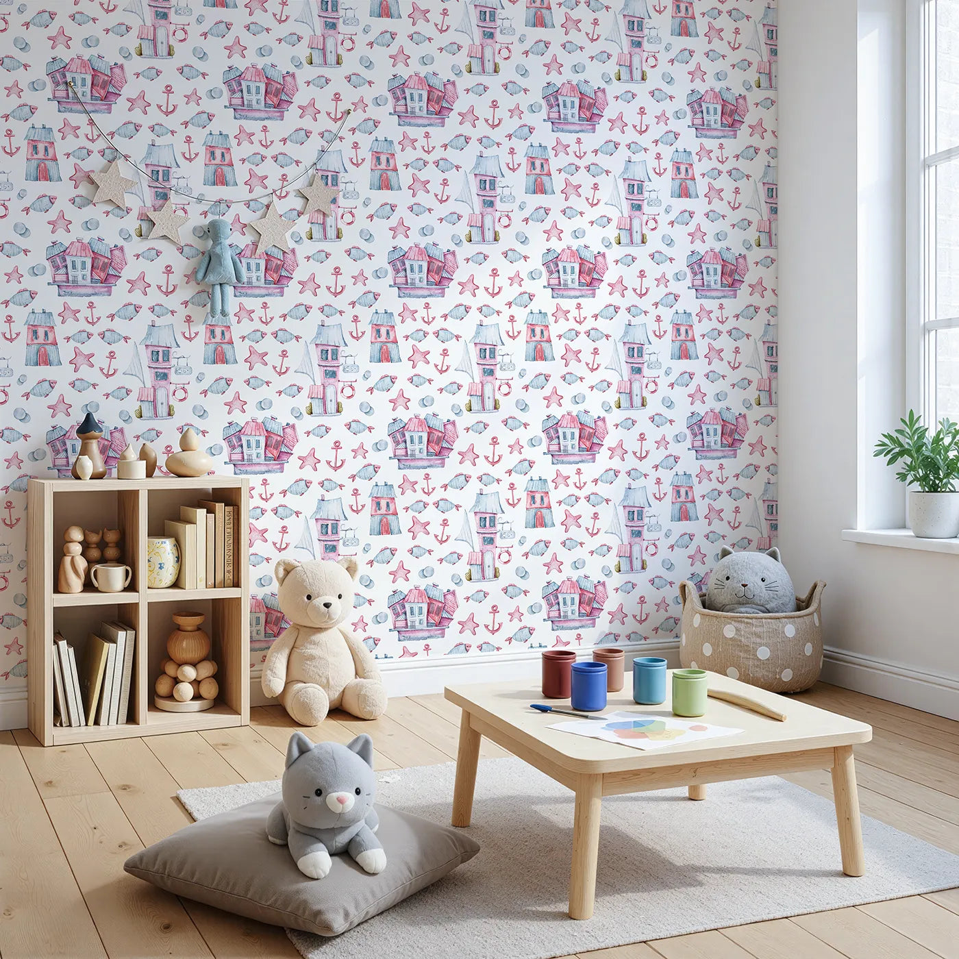 Angled view of Whimsy Tots' Seaside Village Parade Wallpaper in White (W3320A).Charming houses and cheerful fish dance through a playful seaside world.