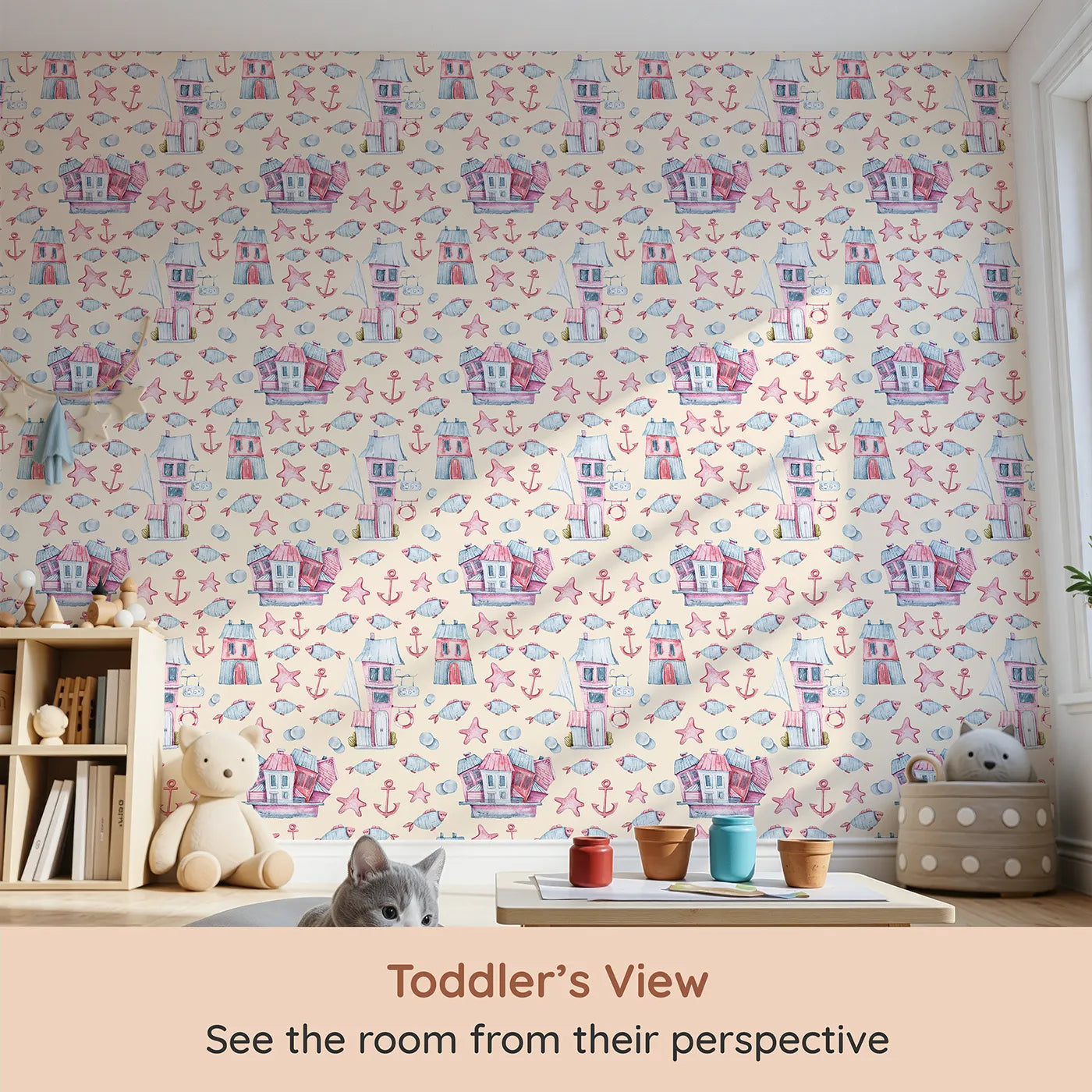 Whimsy Tots Seaside Village Parade Wallpaper in Beige (W3320C) from your child's view.Blushing fish and seaside homes float gently through a sunny shoreline dream.