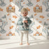 Lovely child standing in front of Whimsy Tots Star Catcher Bunnies Wallpaper in White with rabbit, star, cloud, net in design.