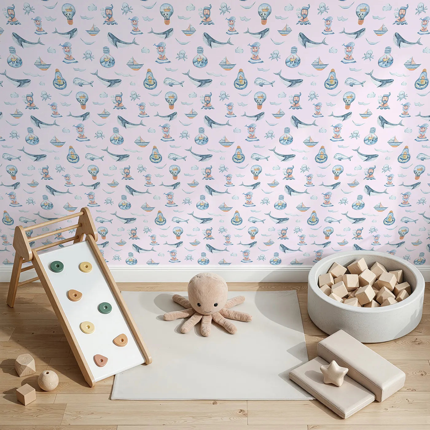 Top-Down view of Whimsy Tots' Maritime Whimsy Wallpaper in Blush Pink (W3326B).Smiling whales and quirky captains float on soft pink seas.
