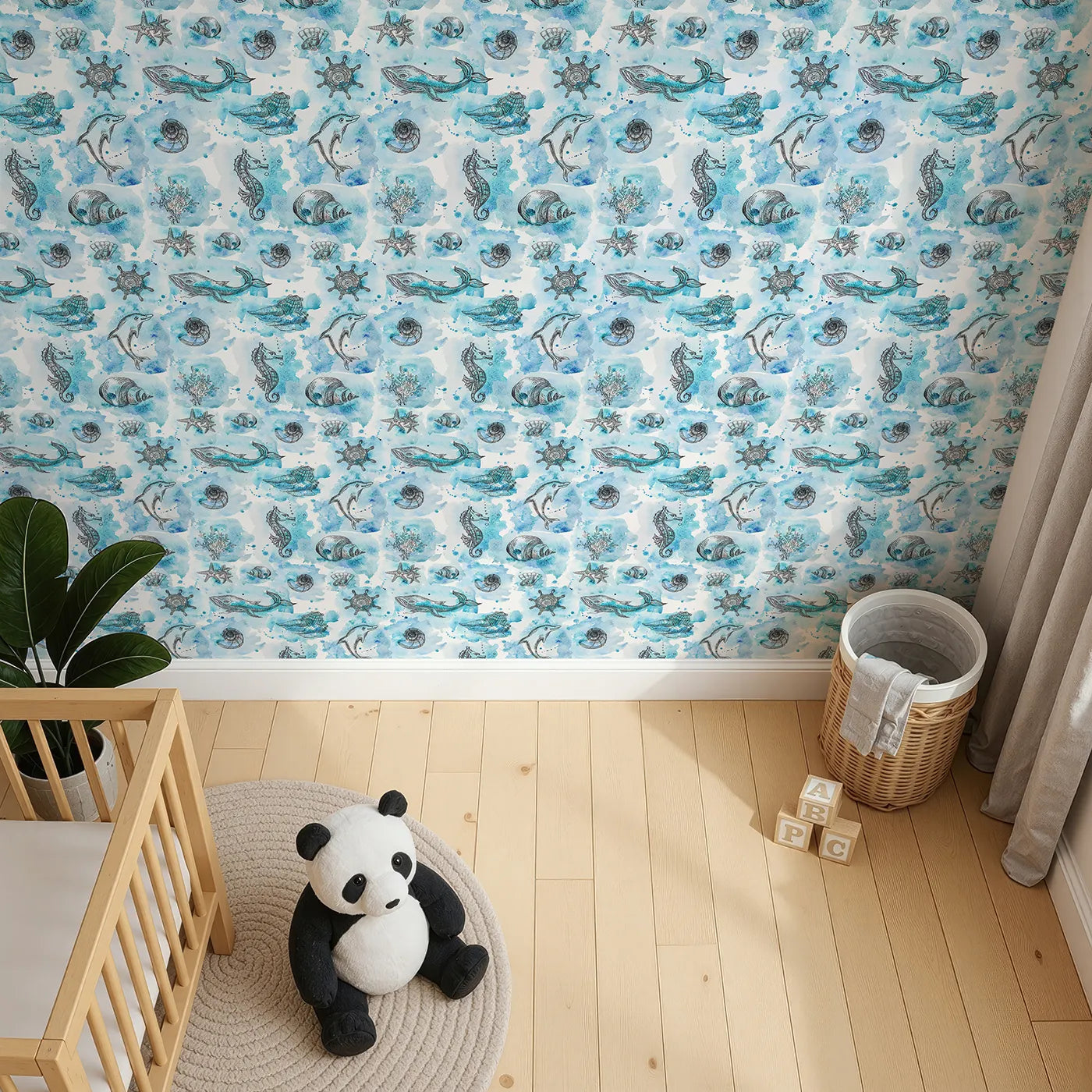 Top-Down view of Whimsy Tots' Ocean Explorer Sketches Wallpaper in Blue (W3332).Watercolor seashells, whales, and dolphins swirl through a dreamy ocean map.