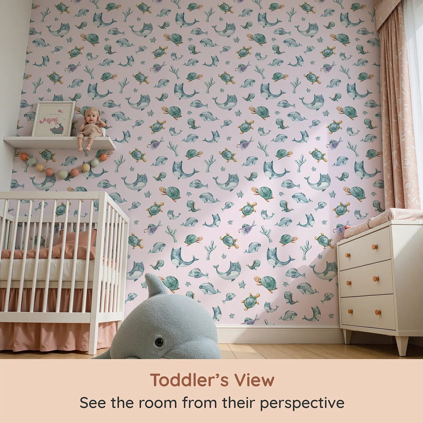 Whimsy Tots Gentle Sea Friends Wallpaper in Pink (W3334B) from your child's view.Soft whales and turtles float peacefully across pastel tides.