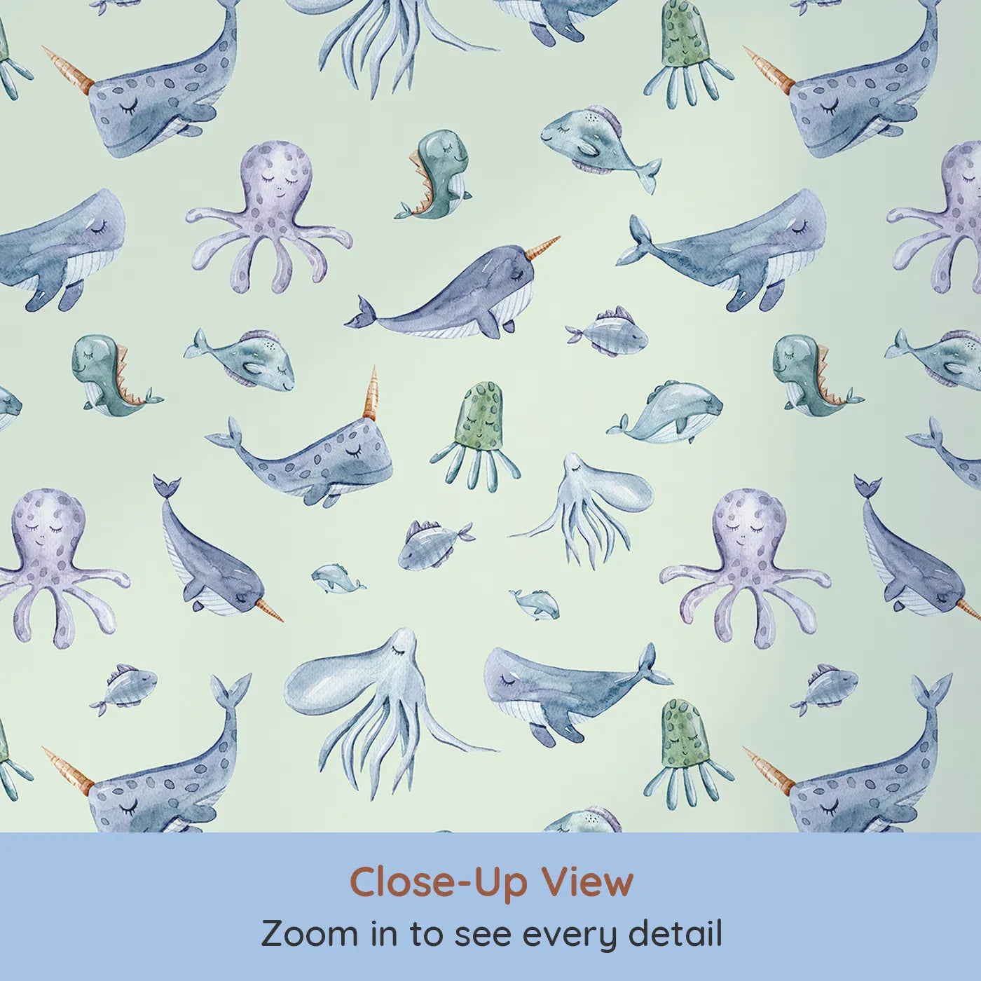 Close-up view of Whimsy Tots' Gentle Ocean Parade Wallpaper in Mint Green (W3335D).Whales and jellyfish float peacefully across minty ocean skies.