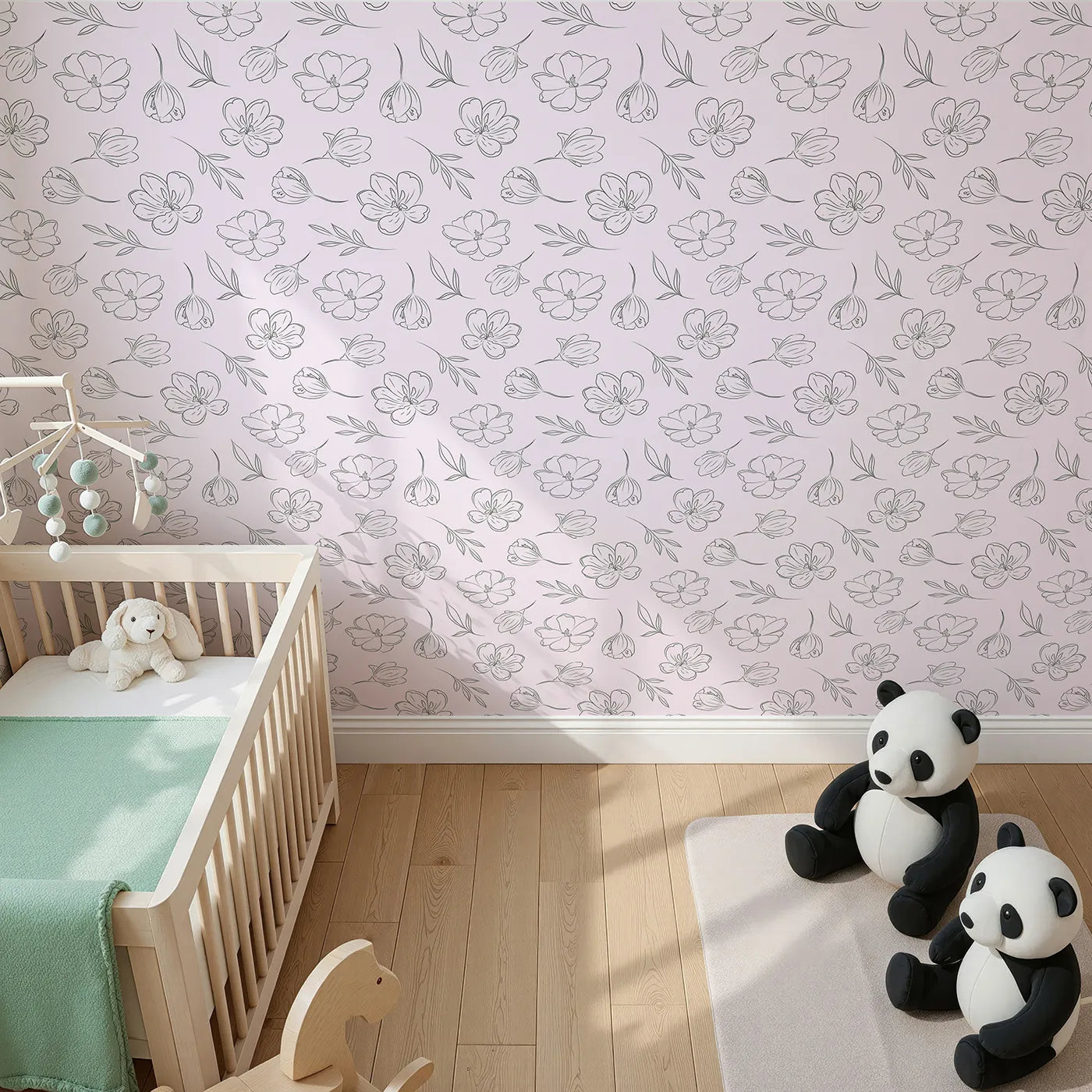 Top-Down view of Whimsy Tots' Line Art Bloom Wallpaper in Blush Pink (W3340B).A graceful bouquet of line-drawn flowers flows across blush pink skies.