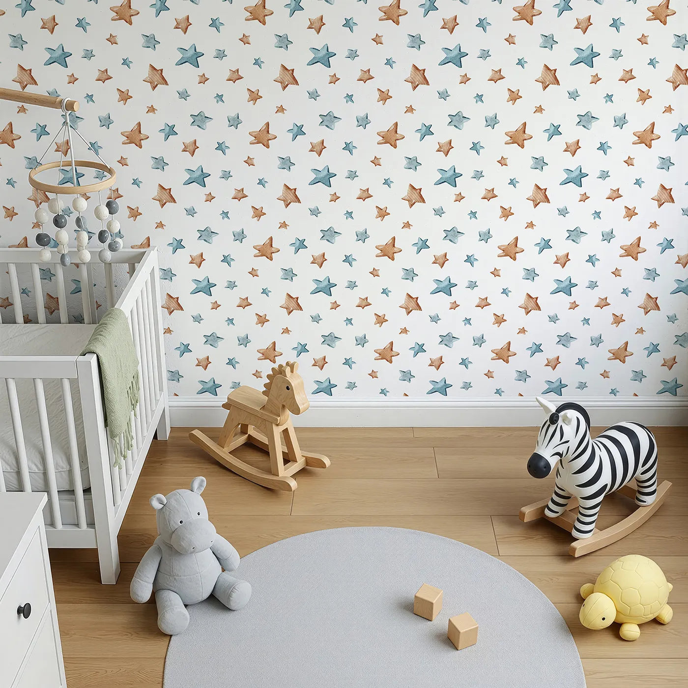 Top-Down view of Whimsy Tots' Starry Drift Wallpaper in White (W3341A).Blue and brown watercolor stars drift across a peaceful white sky.