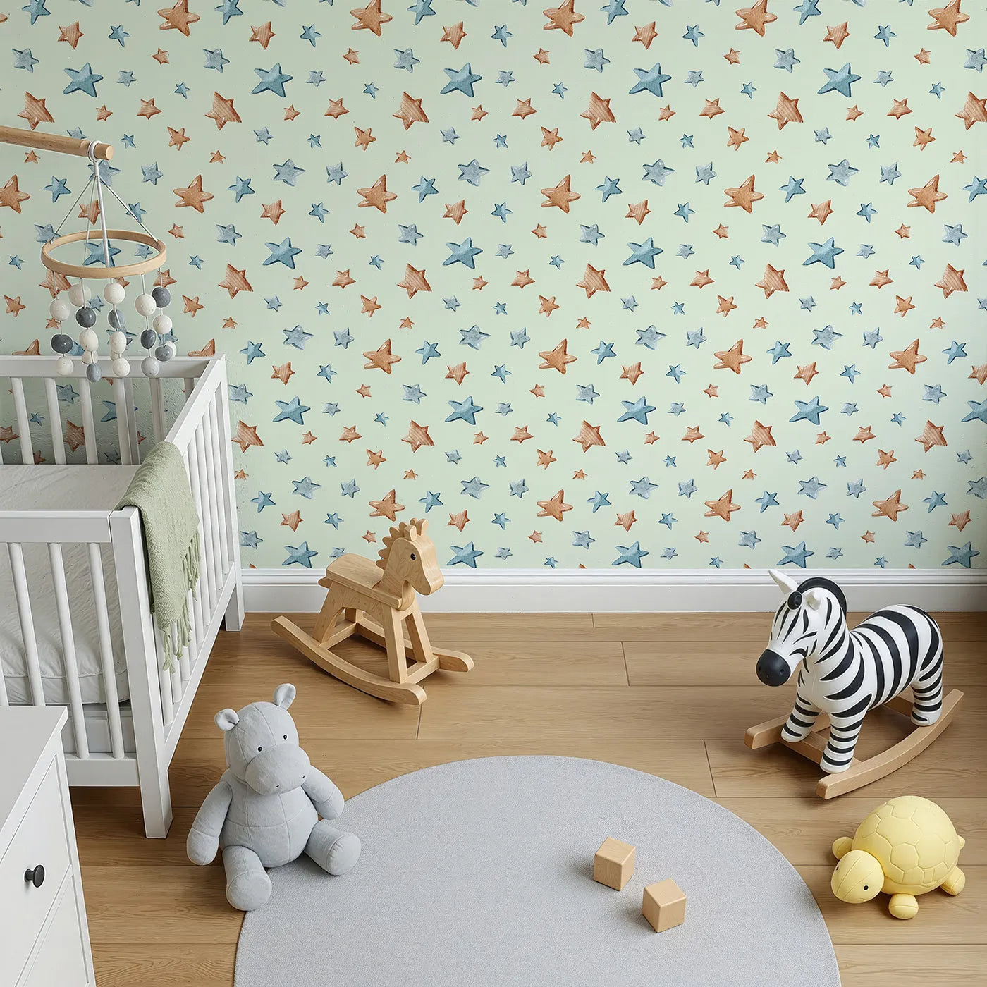 Top-Down view of Whimsy Tots' Starry Drift Wallpaper in Mint Green (W3341D).Brown and blue watercolor stars sparkle on fresh mint skies.