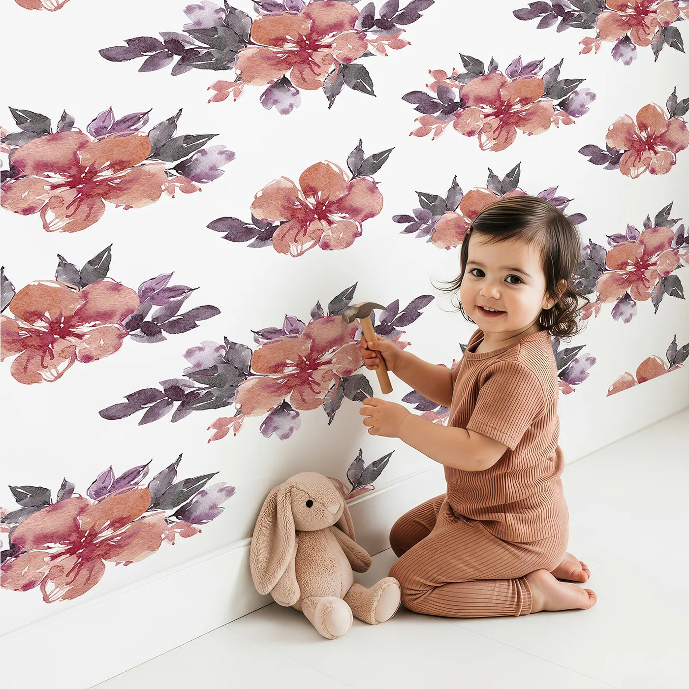 Lovely child standing in front of Whimsy Tots Berry Blush Blooms in White with flower, petal, leaf, sprig in design.