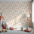Front view of Whimsy Tots' Rustle and Grace Wallpaper in Cream