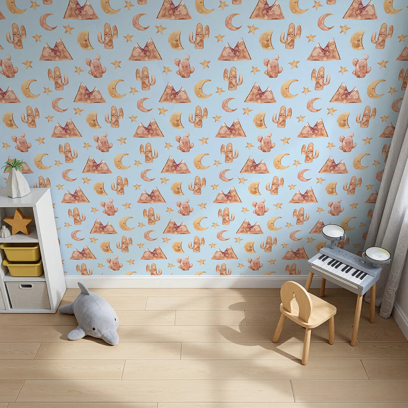 Top-Down view of Whimsy Tots' Desert Moon Dreams Wallpaper in Blue (W3385E).Mountains, moons, and sleepy cacti drift gently across a peaceful blue sky.