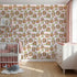 Front view of Whimsy Tots' Secret Garden Cutaway Homes Wallpaper in Blush Pink