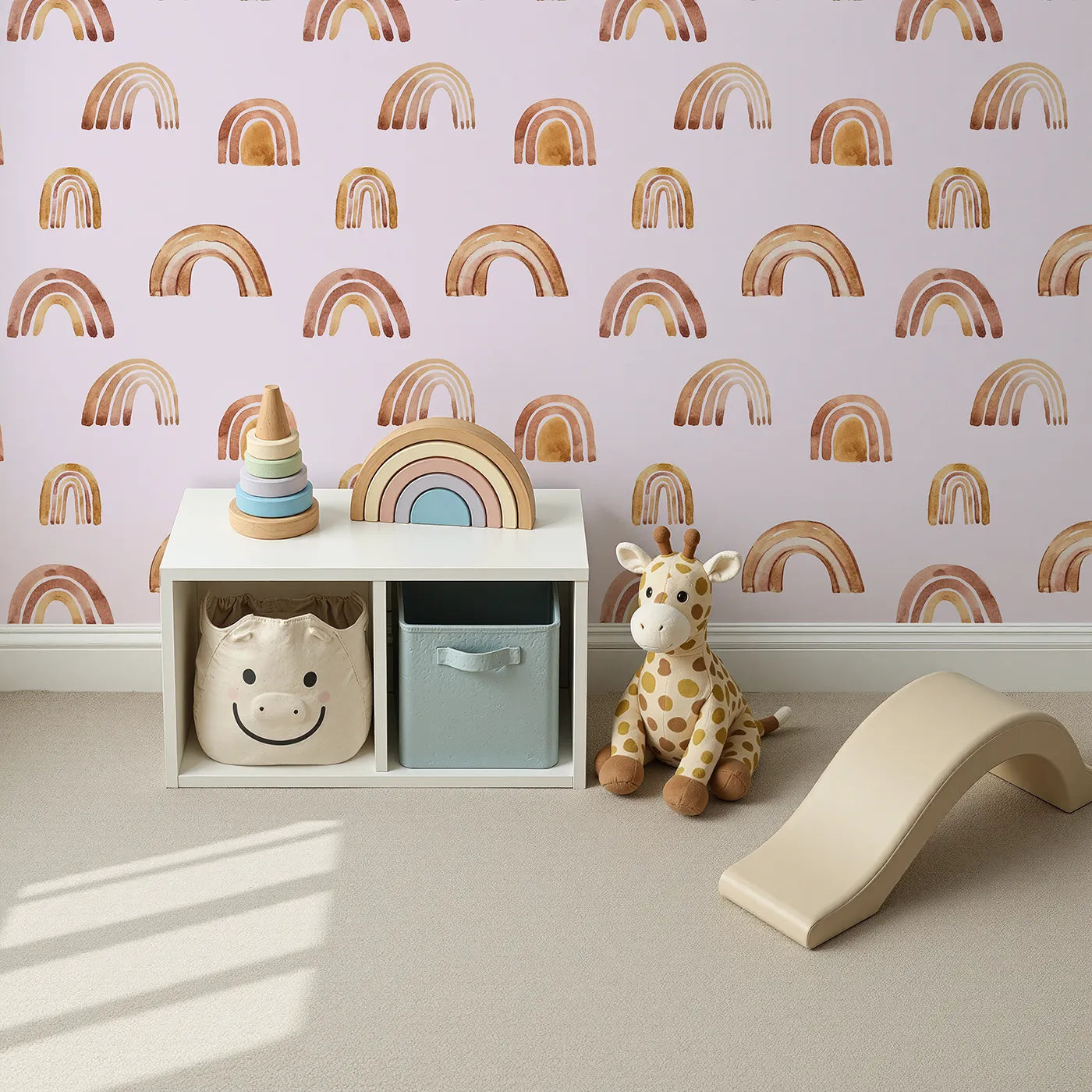 Top-Down view of Whimsy Tots' Boho Brush Rainbow Wallpaper in Pink (W3398B).Earthy rainbows float across a rosy pink sky.