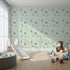 Front view of Whimsy Tots' Seaside Vessel Parade Wallpaper in Mint Green