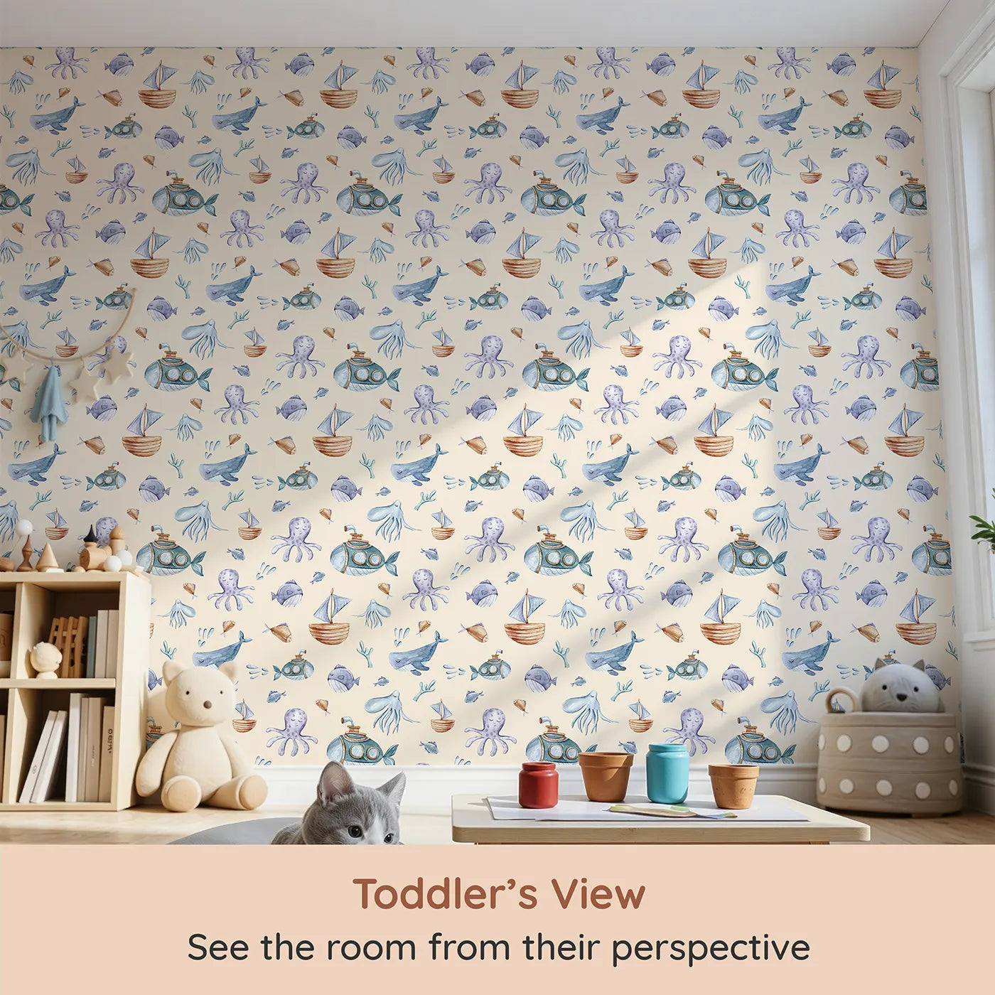 Whimsy Tots Deep Sea Discovery Wallpaper in Beige (W3403C) from your child's view.Watercolor whales, submarines, and jellyfish float through a warm ocean scene.