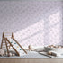 Front view of Whimsy Tots' Petal Outline Bloom Wallpaper in Blush Pink