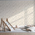 Front view of Whimsy Tots' Petal Outline Bloom Wallpaper in Sand