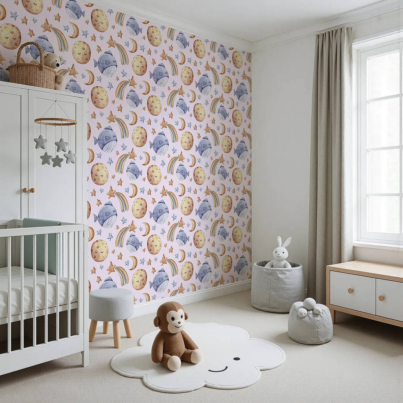 Angled view of Whimsy Tots' Sleepy Celestial Whale Wallpaper in Blush Pink (W3421B).Starry dreams and blushing moons float gently in a pink-tinted sea.