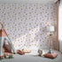 Front view of Whimsy Tots' Busy Bees at Play Wallpaper in Blush Pink
