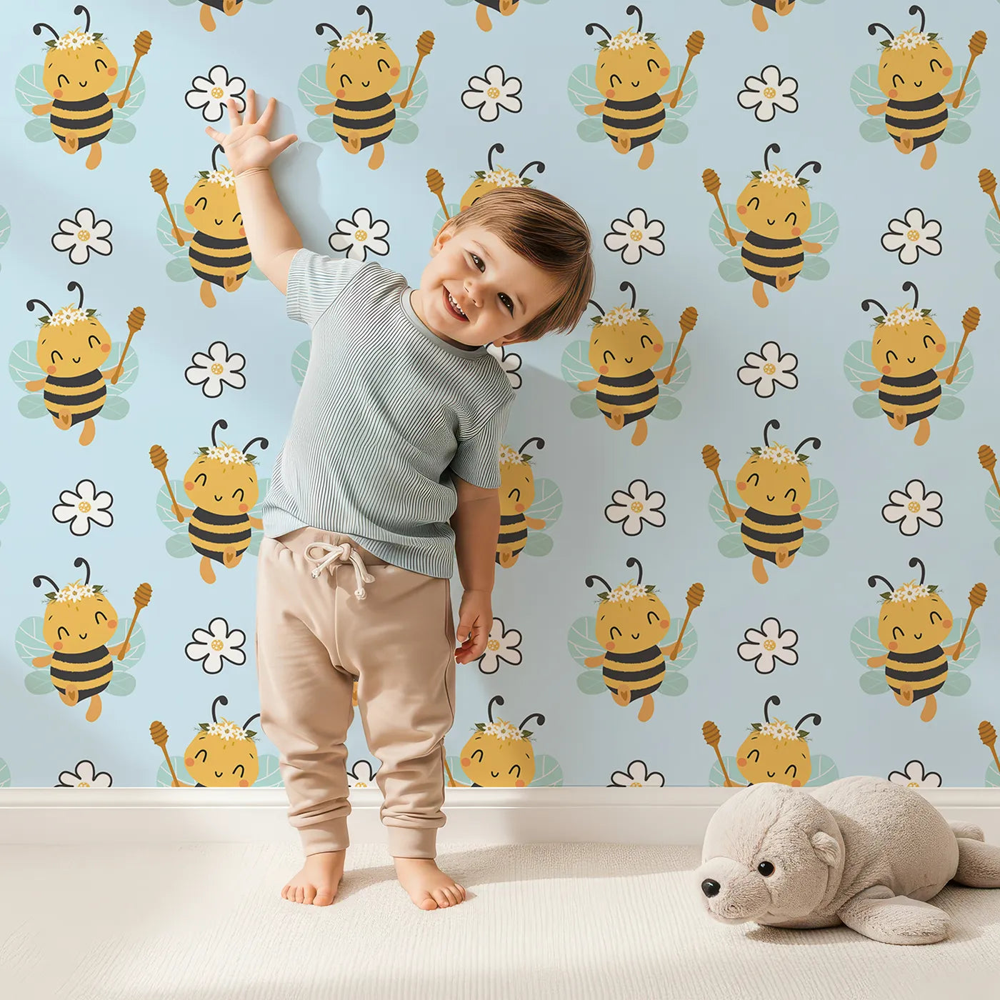 Lovely child standing in front of Whimsy Tots Bee Blossom Parade Wallpaper in Sky with bee, flower, honey in design.