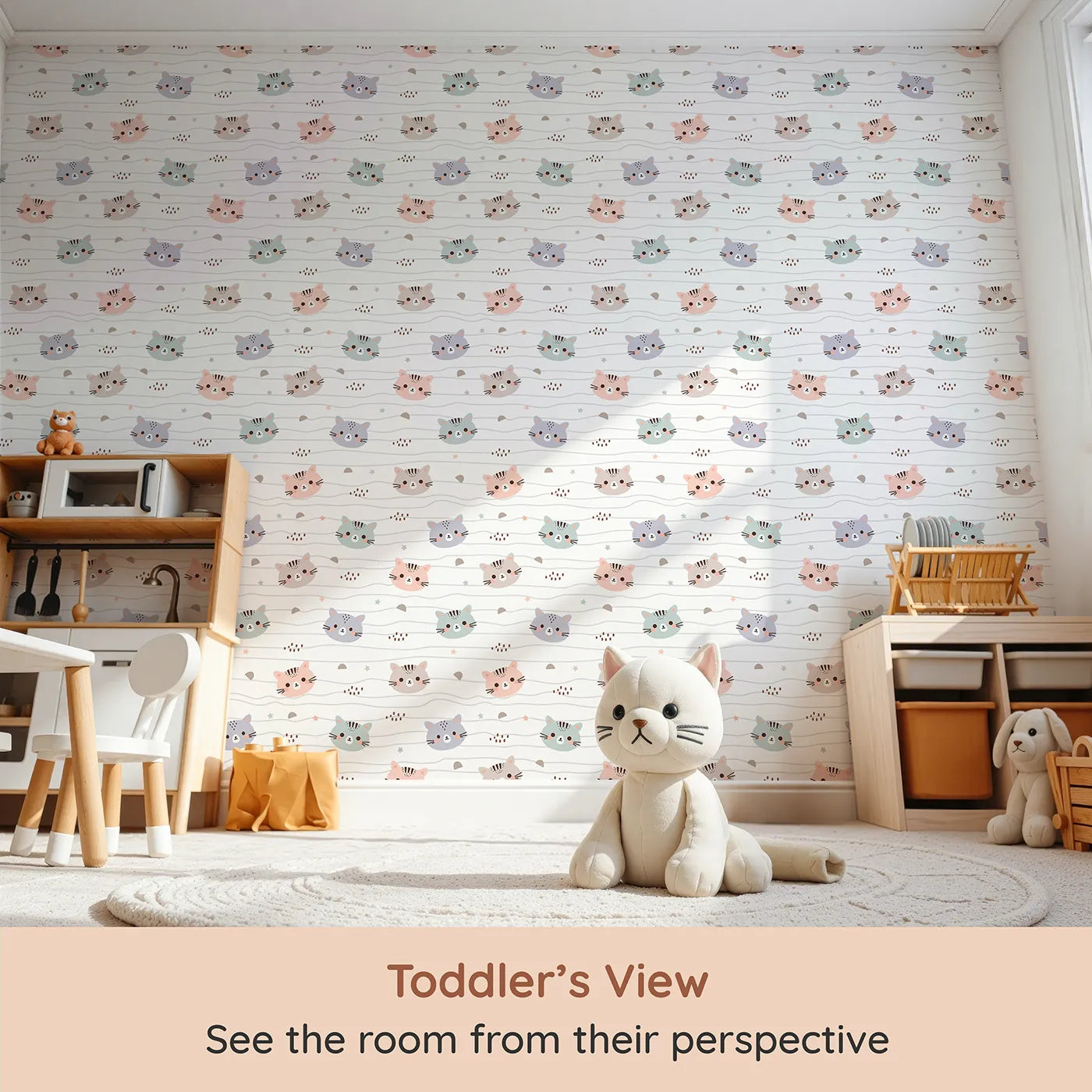 Whimsy Tots Whisker Wiggle Cats Wallpaper in White (W3439) from your child's view.Sweet kitty faces peek out across soft wavy lines and stars.