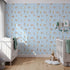 Front view of Whimsy Tots' Sleepy Safari Snuggles Wallpaper in Sky Blue