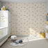 Front view of Whimsy Tots' Safari Nap Bubbles Wallpaper in Peach Beige