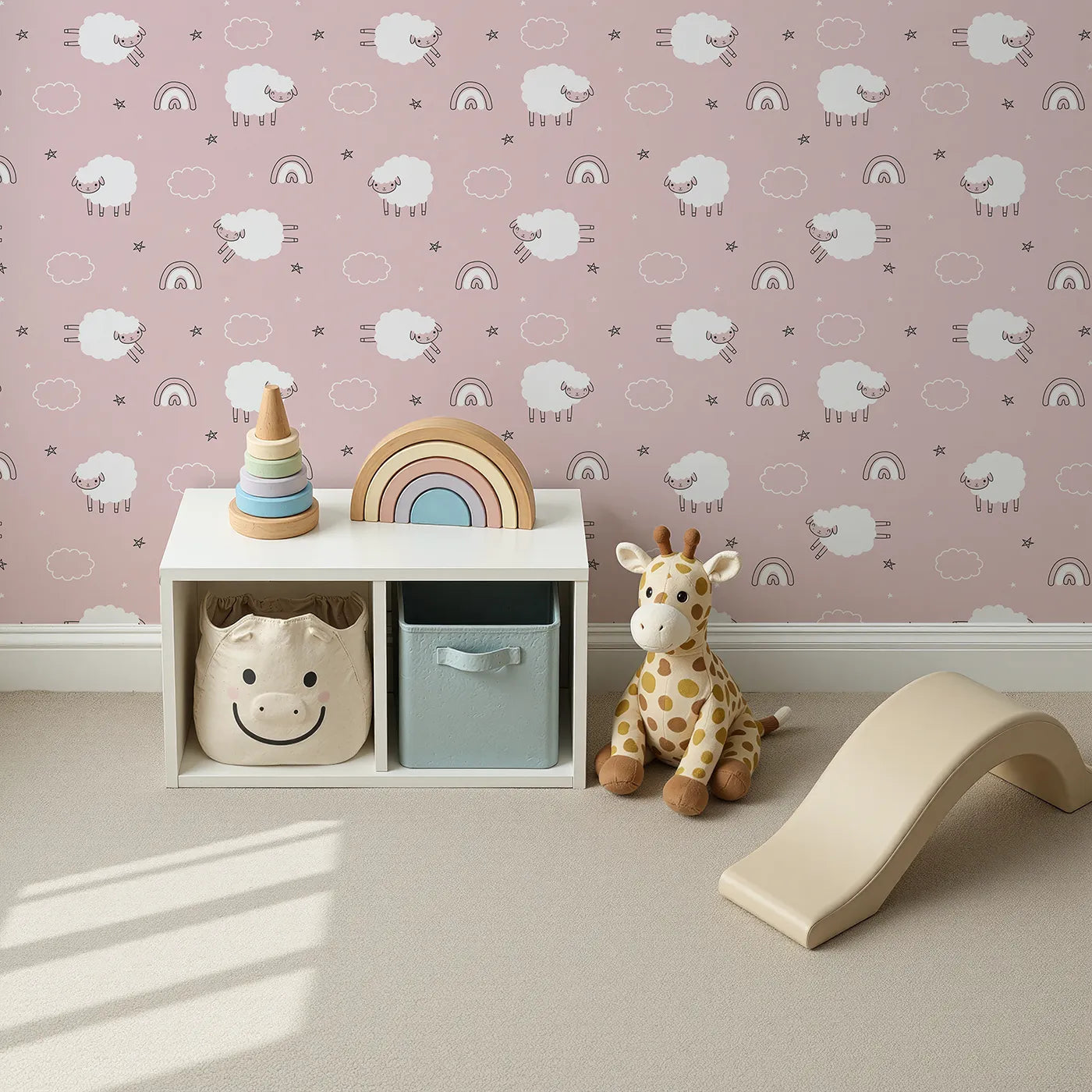 Top-Down view of Whimsy Tots' Sleepy Meadow Parade Wallpaper in Rose Blush Pink (W3453B).Cuddly sheep float among clouds, rainbows, and stars on a dreamy rose background.