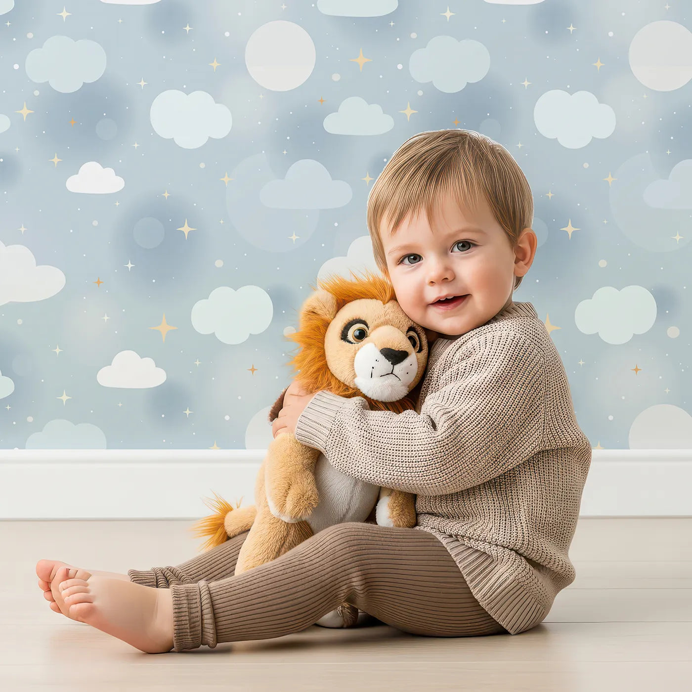 Lovely child standing in front of Whimsy Tots Cloudy Glow Skies Wallpaper in Blue with cloud, star, sparkle, orb in design.