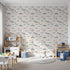 Front view of Whimsy Tots' Tiny Toot Toot Cars Wallpaper in Beige