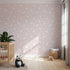 Front view of Whimsy Tots' Little Lamb Hops Wallpaper in Blush Pink
