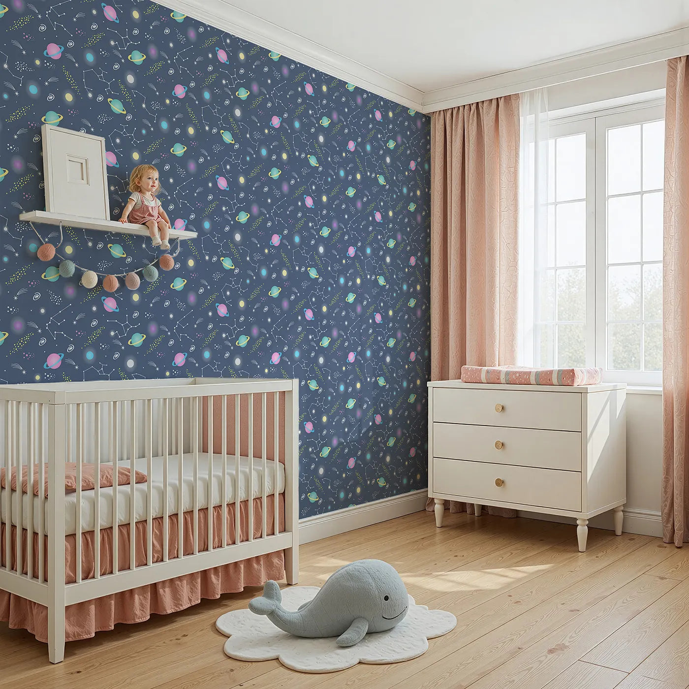 Angled view of Whimsy Tots' Planet Pop Galaxy Wallpaper in Deep Blue (W3473A).Popping planets, shooting stars, and constellations fill their space with wonder.