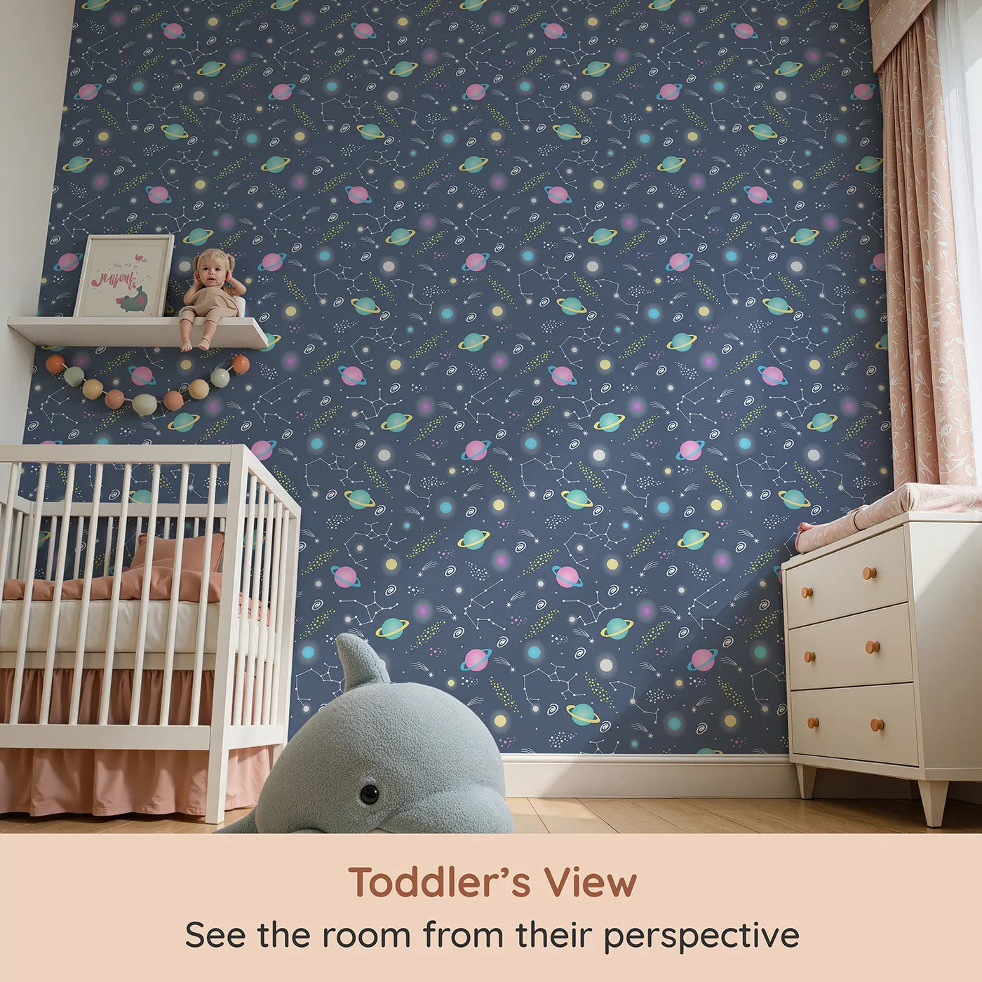 Whimsy Tots Planet Pop Galaxy Wallpaper in Deep Blue (W3473A) from your child's view.Popping planets, shooting stars, and constellations fill their space with wonder.