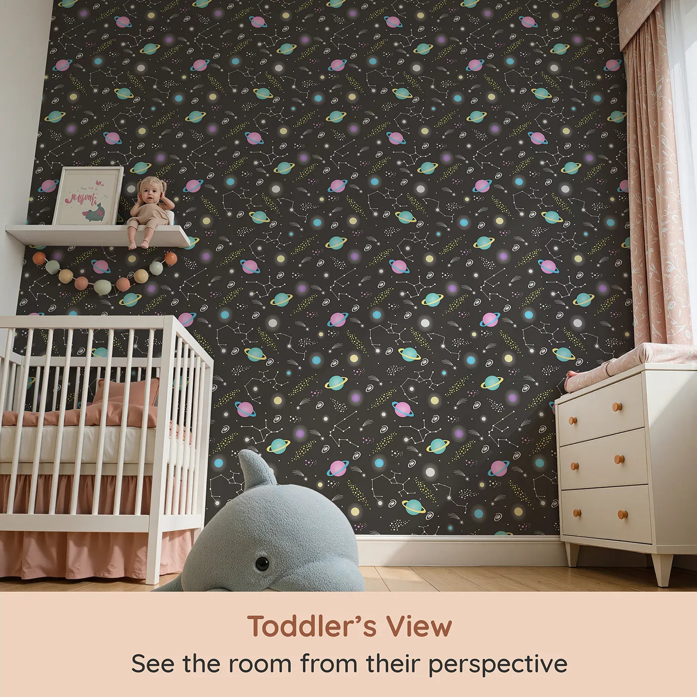 Whimsy Tots Planet Pop Galaxy Wallpaper in Starry Black (W3473C) from your child's view.Bright pastel planets glow boldly against a starry black galaxy sky.