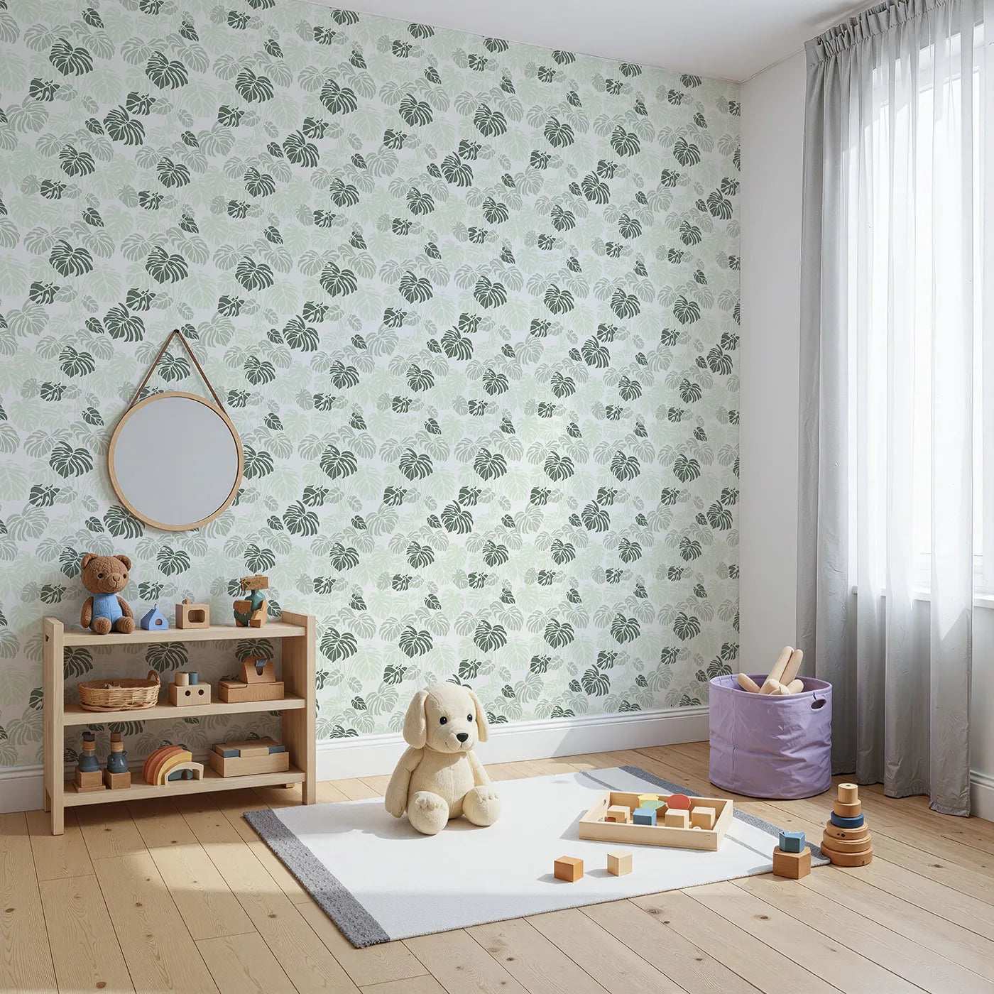 Angled view of Whimsy Tots' Monstera Jungle Wallpaper in Mint Mist Green (W3485B).Soft mint monstera leaves create a peaceful play of nature and calm.