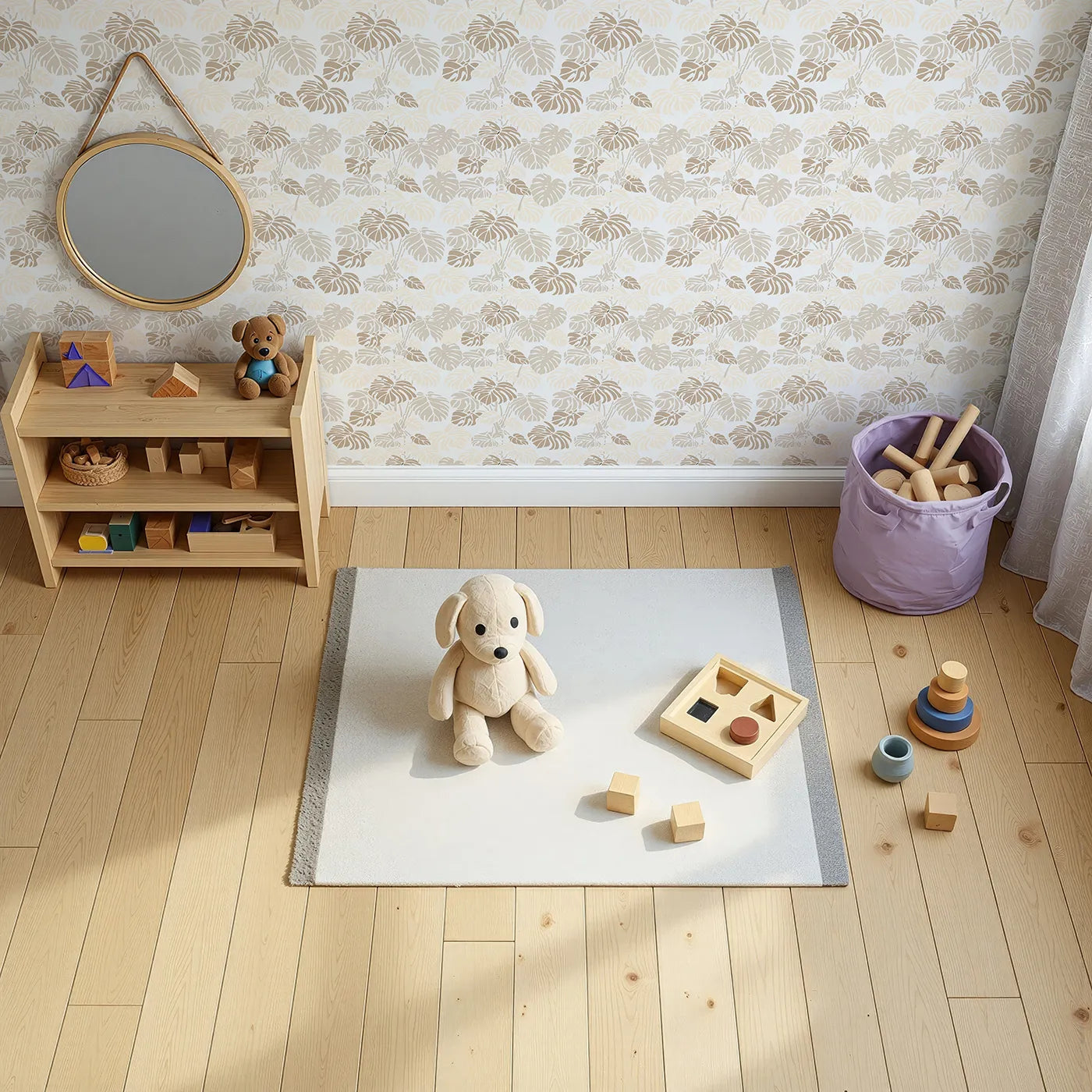 Top-Down view of Whimsy Tots' Monstera Jungle Wallpaper in Sandstone Beige (W3485C).Soft beige monstera leaves invite calm and comfort into their space.