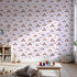 Front view of Whimsy Tots' Animal Racers Wallpaper in Blush Pink