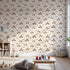 Front view of Whimsy Tots' Animal Racers Wallpaper in Warm Beige