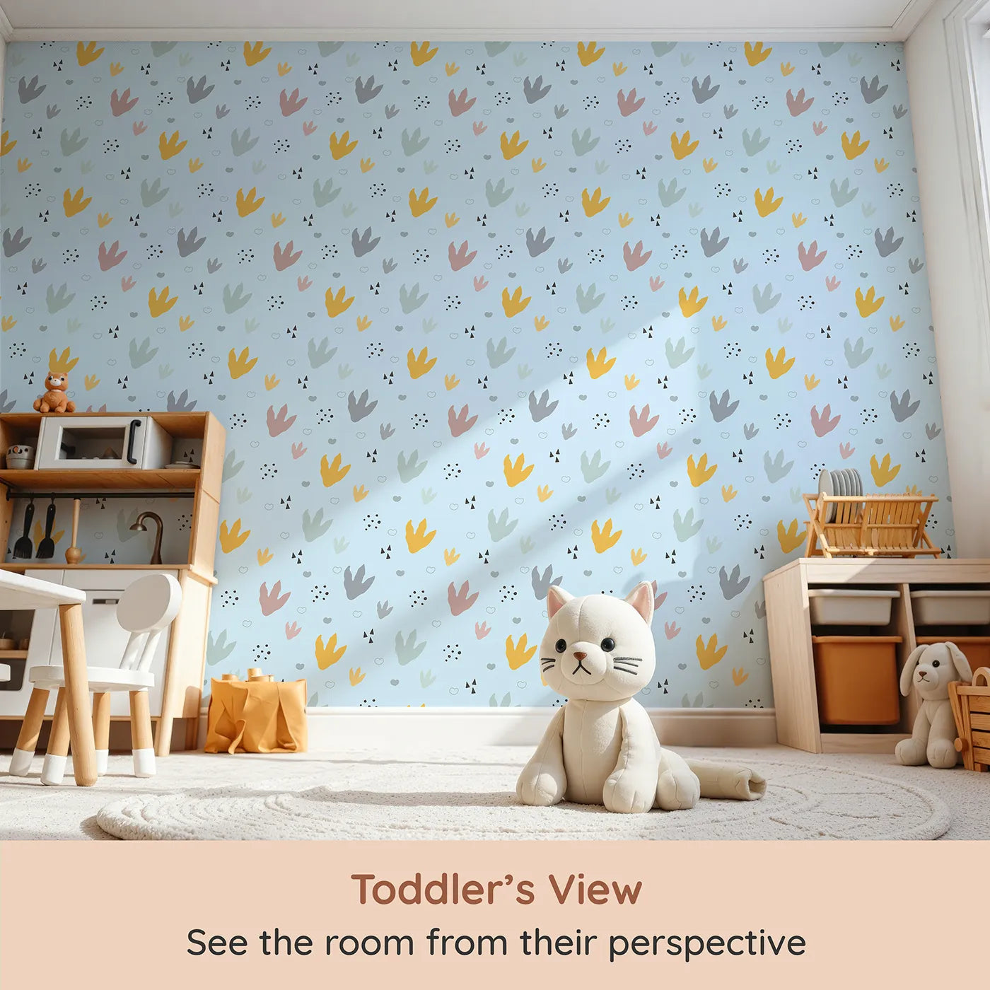 Whimsy Tots Dino Stomp Parade Wallpaper in Sky Blue (W3495E) from your child's view.Colorful dinosaur tracks pop against a cheerful sky blue backdrop.
