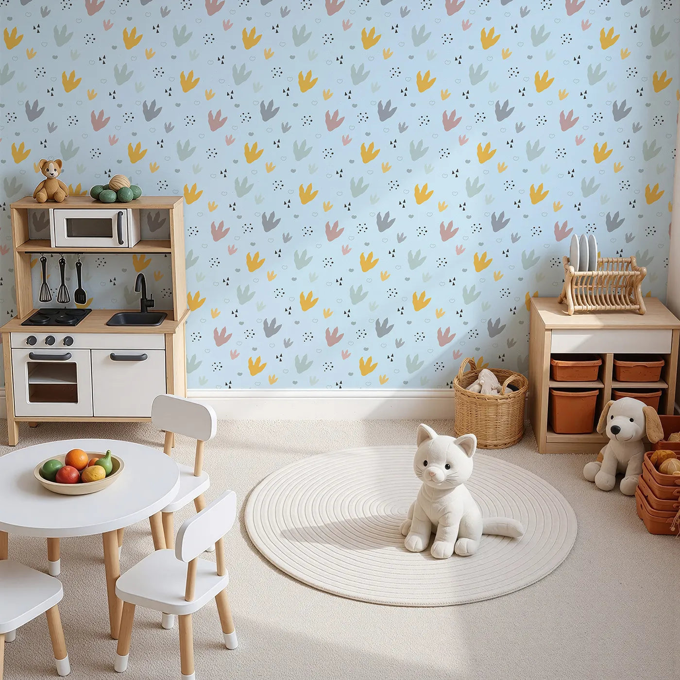 Top-Down view of Whimsy Tots' Dino Stomp Parade Wallpaper in Sky Blue (W3495E).Colorful dinosaur tracks pop against a cheerful sky blue backdrop.