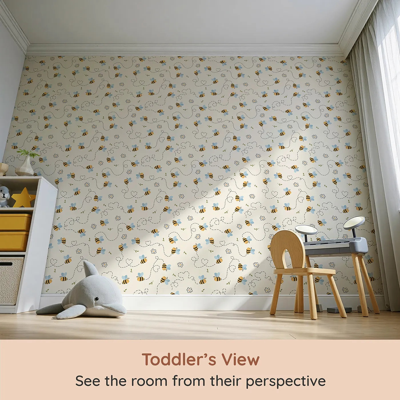 Whimsy Tots Busy Bee Trail Wallpaper in Buttercream (W3497A) from your child's view.Cheerful bees zigzag across a warm buttercream sky with heart-shaped trails.