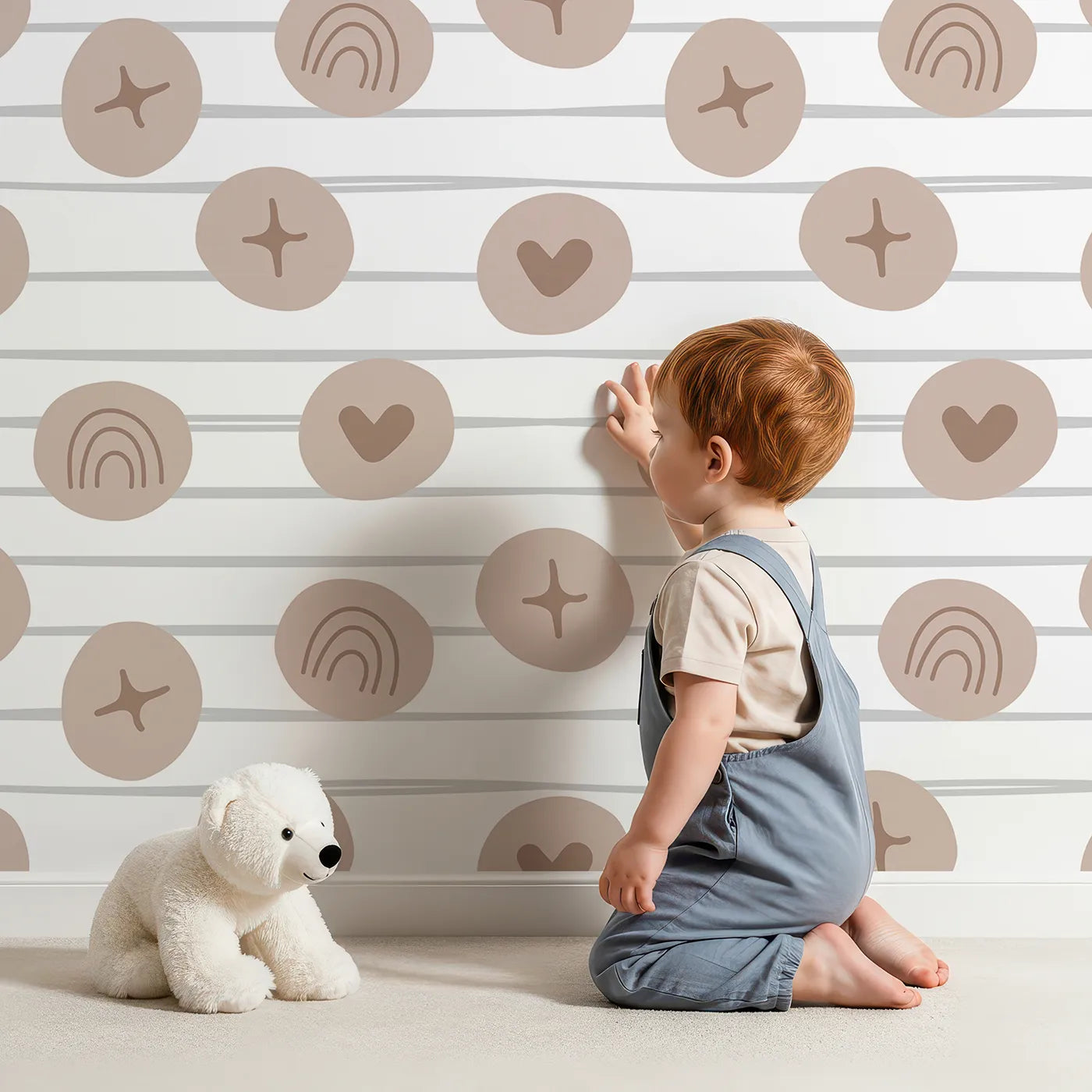 Lovely child standing in front of Whimsy Tots Boho Rhythm Doodle Wallpaper in Soft White with rainbow, heart, star, stripe, doodle in design.