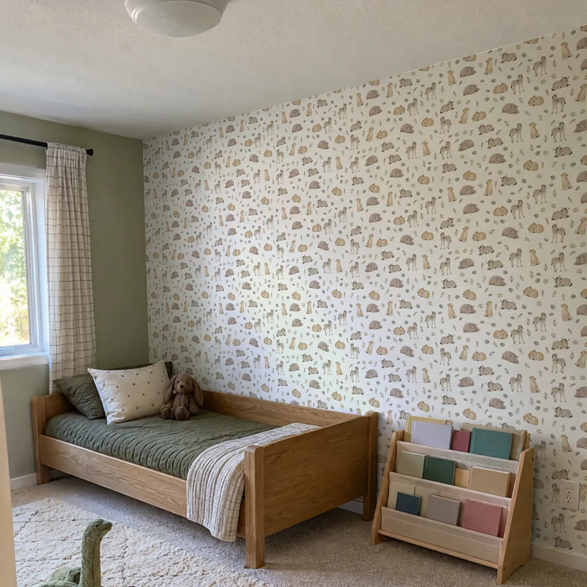 Watercolor wallpaper of sleeping zebra foals, lion cubs and hippos on cream, in a room photo, by Whimsy Tots