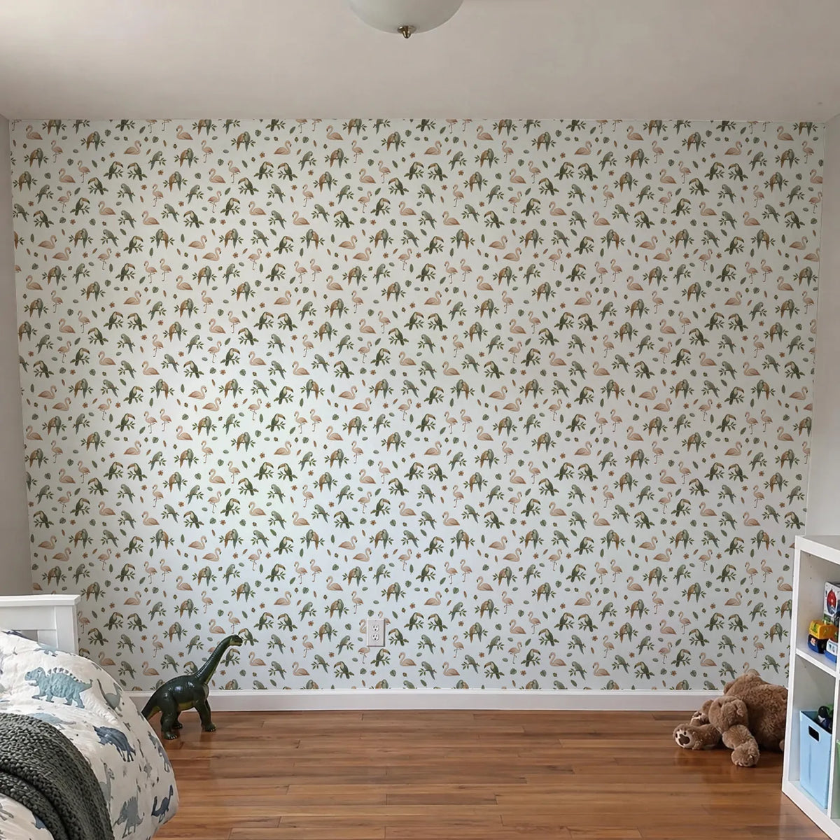 Gouache wallpaper of resting flamingos, parrots and toucans, in a room photo, by Whimsy Tots