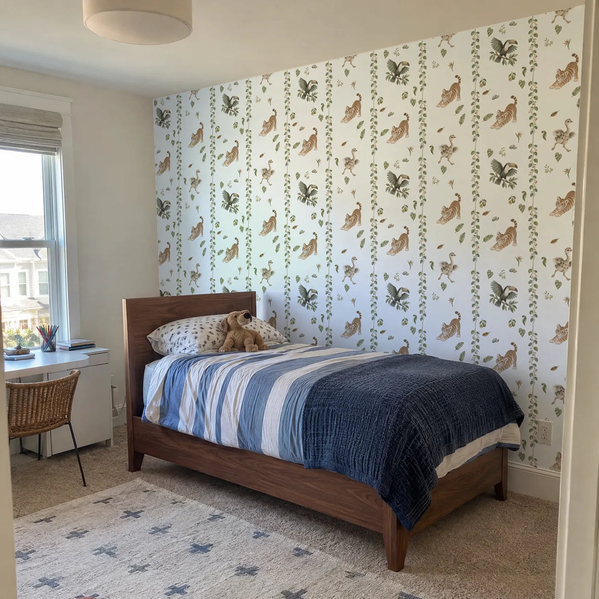 Watercolor wallpaper of jungle vine stripes with tiger cubs and a toucan, in a room photo, by Whimsy Tots
