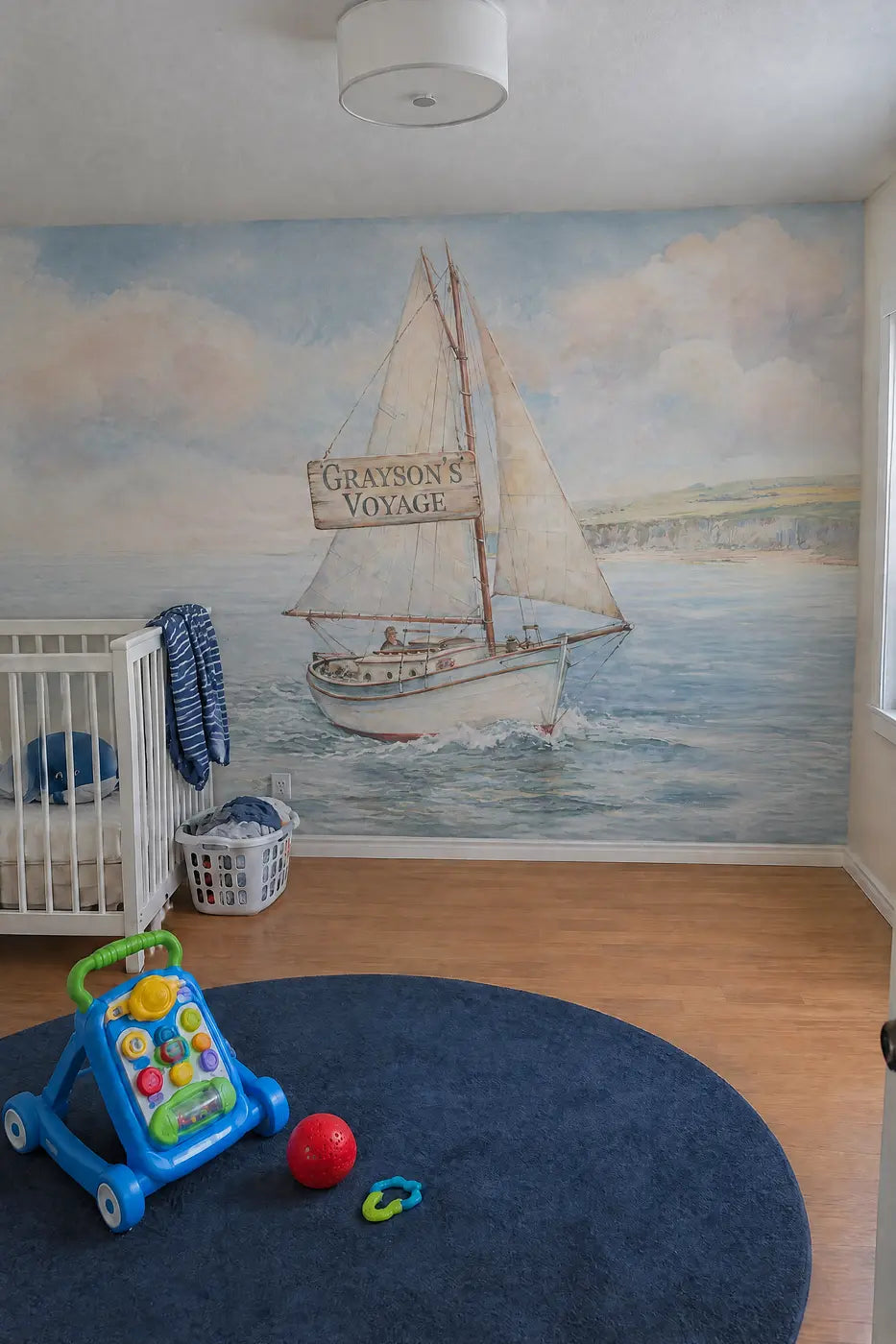 Little Sailboat Voyage Personalized Wall Mural in a nursery by Whimsy Tots